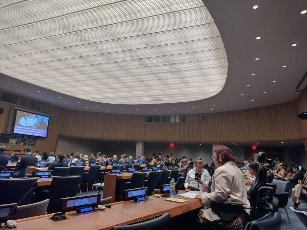 A large formal UN meeting room